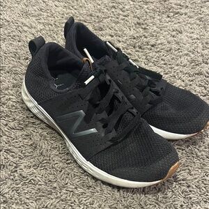 New Balance women’s Black tennis Shoes